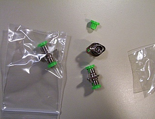 Minimum order qty: 100pc. Simplex FC/APC to FC/APC. Simplex FC/APC to FC/APC, insertion loss less than 0.1dB. Oval Flange. Key width is about 2.02mm. Zirconia internal split sleeve. P/N: AF1PA-Z