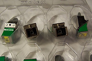 Min order qty: 10pc. Simplex fiber adapter SC/APC to SC/APC, with shutter, Zirconia internal split sleeve. Molex P/N: 1061164520