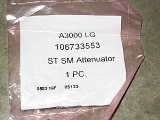 Adapter ST to ST for SMF, with circular screw nut and washer, with metal housing. OFS P/N: 106733553