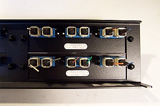 Adapter panels in 19 inch rack. With 20 simplex SC adapters. With bronze internal sleeve. For 20 MM fibers.