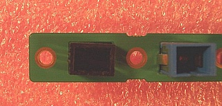 Cover for panel hole (cutout) of simplex SC or duplex LC adapter. Snap in type.