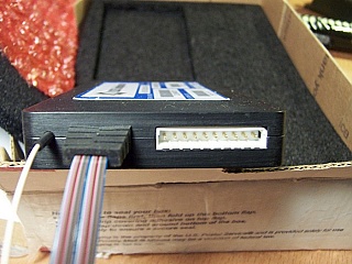 Product label shows 1x40 40-ch AWG Mux-DeMUX, JDS P/N: AWGVGBF0D10001, Center wavelength: 1552.52nm. Not completed product. 'Sell As Is', 'No return'