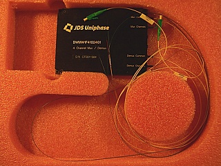 4 Channel 100GHz Mux and Demux Module. It includes one 1x4 100GHz mux and one 1x4 100GHz demux, 4 channel wavelengths: from 1558.17nm to 1560.61nm. JDS P/N: DWMW1F4102401