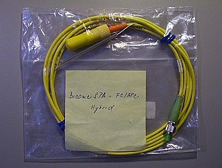 Biconic - FC/APC SMF 2-meter simplex jumper. With fusion-splice at the middle.