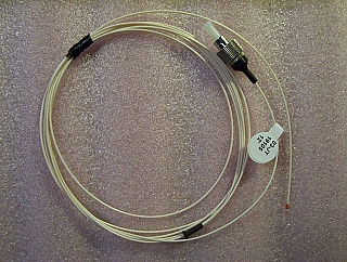 FC/PC(UPC) connector to 2.25mm 12-degree-angled tube/ferrule 2-meter SM jumper/pigtail. 900um-buffered fiber. JDS P/N: ED0009748-A-42.