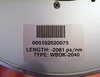 Lucent(OFS) DCM for about 120km standard SMF dispersion compensation, Lucent(OFS) model: WBDK:2040.   about -2040 ps/nm, 100% compensation.