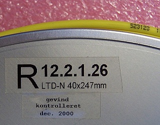 DCM for about 100km standard SMF dispersion compensation, Lucent(OFS) model: WBDK:1700.   -1723 ps/nm, 100% compensation.