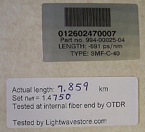 Lucent(OFS) C-band DCM for about 40km standard SMF dispersion compensation,  -691 ps/nm, with dispersion slope compensation.  Lucent(OFS) type: SMF-C-40, P/N: 994-00025-04.