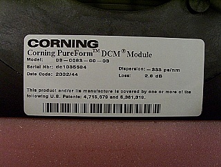Corning pureform DCM for 1.55um C-band, dispersion: about -333 ps/nm. Model: 03-0083-00-03, for 20km standard SMF compensation.