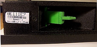 Three C-band DCM within rack mount, each DCM (dispersion: -166, -329, or -166 ps/nm/km) is for 10km, 20km, or 10km standard fiber compensation. Ciena Corestream P/N: 600-3192-202