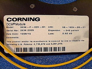Corning DCM for 1.55um C-band, dispersion: about -340 ps/nm. DCM-F-020,for 20km standard SMF compensation.