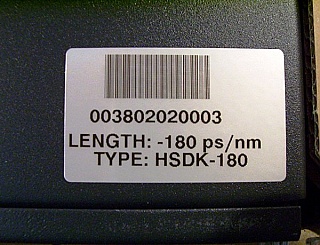 DCM (fiber spool) for truewave fiber by Lucent(OFS). About -180ps/nm for C-band.  TYPE: HSDK:180