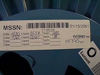2.177km Lucent dispersion-compensating-fiber (DCF), in raw fiber roll. Model number is unknown
