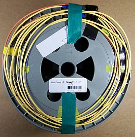 15.999km Lucent/AT&T dispersion-shifted fiber (DS,DSF) spool. With zero dispersion around 1550nm. With actual dispersion test data. With 2 FC/PC fiber connectors. Fiber ID number ending with 'DCB'.