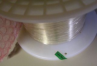 C-band Erbium Doped Fiber, OFS model: MP980, P/N:107770935. Price is for one roll of 594-meter.