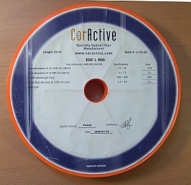 About 757 meter C-band Erbium Doped Fiber, CorActive model: EDF-L 900. Price is for one spool/roll
