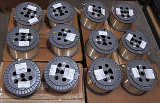25km or 30km Lucent/AT&T Truewave "-" fiber spool. With negative dispersion around 1550nm. Without fiber connectors. 'UFO' Fiber. Without actual dispersion test data.