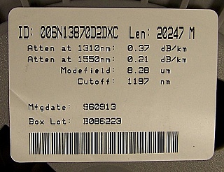15km to 20km Lucent Truewave "-" fiber spool. With negative dispersion around 1550nm. Without fiber connectors. Fiber ID number ending with "DXC". New