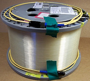 25.084km Lucent Truewave "-" fiber spool. With negative dispersion around 1550nm. With actual dispersion test data. With 2 FC/PC fiber connectors. Fiber ID number ending with "DXD".