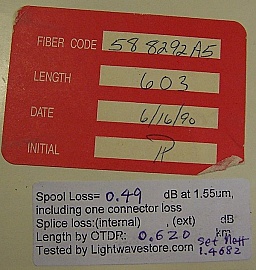 0.62km SMF bare fiber spool, with one SC/PC connector and another unknown-type connector