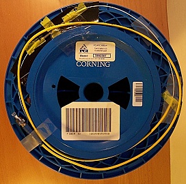 20.56km SMF-28 bare fiber spool, with 2 FC/UPC connectors. Loss is slightly higher than normal (4.6dB)