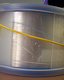 25.26km SMF-28 bare fiber spool with 2 FC/UPC connectors