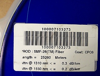 25.26km SMF-28 bare fiber spool, without fiber connectors.