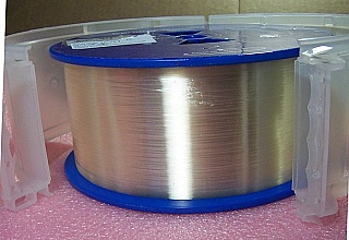 25.26km SMF-28 bare fiber spool, without fiber connectors.  Internal end is not accessible