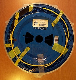 50.48km SMF-28 bare fiber spool, with two FC/UPC connectors. Loss is 10.4dB.