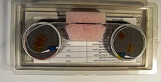 2%/98% wideband 1x2 coupler over 1270-1350nm and 1510-1590nm. With two LC/PC connectors. Oplink P/N: DWFC102JD. Previous owner marked 'fail', so it is 'Sell As Is', 'No Return'