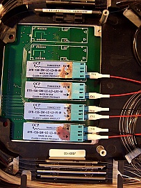 OC-192 Optical interface module for L-band, around 1585nm, removed from Innovance OC-192 long haul transmission system: TLI-4 card.  With 3pc DTR-156-SM-LC-L3-IR-M and 1pc  DTR-156-SM-LC-LO-LR1-M SFF transceivers, 2x5 pinout. JDS P/N: OIA0003-02. 21035136