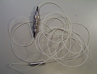 1550nm single-stage isolator, with FC/PC connectors. Model: PIFI23AS44111. A-grade