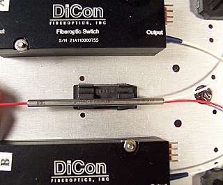 Combo of dual Dicon 1x1 switch and one ADC 1x2 3dB coupler. For 1.55um. Mounted on Aluminum plate. 'Sell As Is'. Without test data