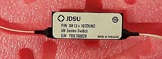 1x2 JDSU latching Switch without fiber connectors, 1290-1330nm and 1525-1575nm. JDS P/N: SN12+107DUNC.