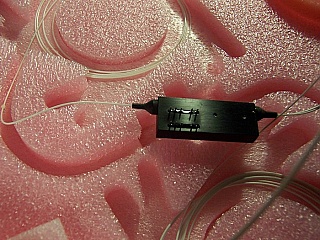 1x2 JDSU latching Switch without fiber connectors, 1290-1330nm and 1525-1575nm. JDS P/N: SN12+107DUNC.