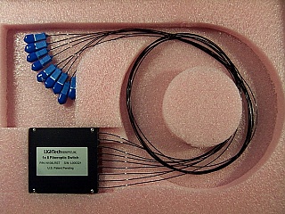 1x8 LT800-series switch module, single-mode fiber, 1.55um wavelength. With BSC II/UPC connectors. LIGHTech P/N: N108LRST-SCU2.
