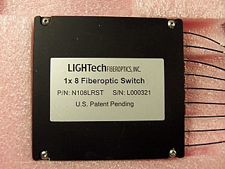 1x8 LT800-series switch module, single-mode fiber, 1.55um wavelength. With BSC II/UPC connectors. LIGHTech P/N: N108LRST-SCU2.
