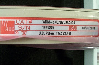 1310/1550nm unidirectional mux/demux in one case. SC/UPC. 2001 model. ADC P/N: WDM-27U7BL2A0000