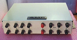 Fiber optic junction box made by Amp. Wall-mount unit with metal case.