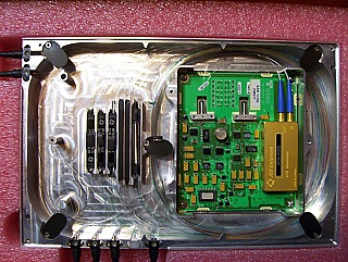 Gain-flat 1.55um passive EDFA line-amp module by JDS. OA1510-32-LINE.  External pump lasers are required.