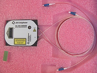 OA 400 C-band series mini EDFA module,  fixed gain, 13dBm saturated output. JDS model: OAA-13U04G5CB. P/N: 21055039. With detailed test data