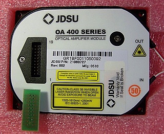 OA 400 C-band series mini EDFA module,  fixed gain, >13dBm saturated output. JDS model: OAA-13U04G1CB-R. P/N: 21089727.