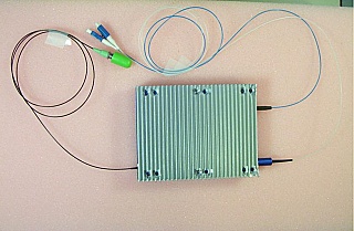 15xxnm Optium 10Gb long-reach DWDM transponder. Model: 10TREEU6FPL.