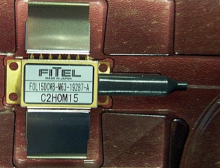 1554.335nm 20mW DWDM DFB laser. With FC/PC fiber connector. Fitel model: FOL15DCWB-M63-19287-A.