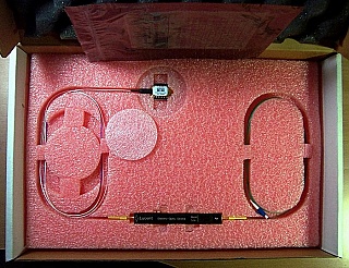 Combo of 10Gb dual-drive intensity modulator module and 10mW 1531.11nm PMF laser module (Lucent modulator model: M2623W, Lucent laser model: D2584P58). There is fiber between modulator and laser modules.