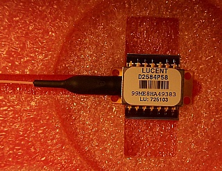 Combo of 10Gb dual-drive intensity modulator module and 10mW 1531.11nm PMF laser module (Lucent modulator model: M2623W, Lucent laser model: D2584P58). There is fiber between modulator and laser modules.