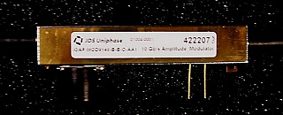 C-band and L-band  10Gb/s  optical digital intensity modulator.  Zero chirp. JDS P/N: IOAP-MOD9140-B-B-0-AA1.  With FC/PC connector at both fiber ends.