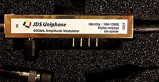40Gb/s optical amplitude modulator, with tap coupler (development). For 1.55um C band.  With three FC/PC fiber connectors at all fiber ends. SDL/JDS product identity: 100-13002 Alpha Build.