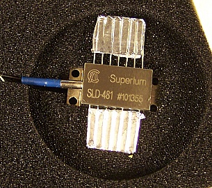 Around 970nm max-10mW SLD.   14-pin butterfly package. Superlum model: SLD-481-HP1-DBut-SM-PD. Manufacture test data shows 972nm center, 35.5nm FWHM
