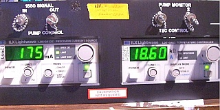 Corning fiber amplifier demonstrator,  >14dBm flat over C-band at 4dBm input. With ILX 200mA laser driver ($650) and 2A Temperature controller ($630) instruments, and EDFA module ($450).